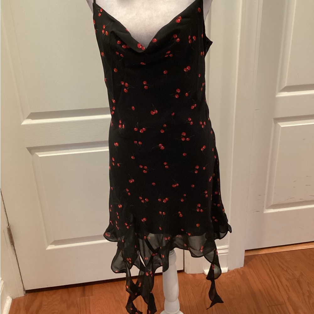 Sleeveless Cherry Print Dress With Cascading Ruffle Detail